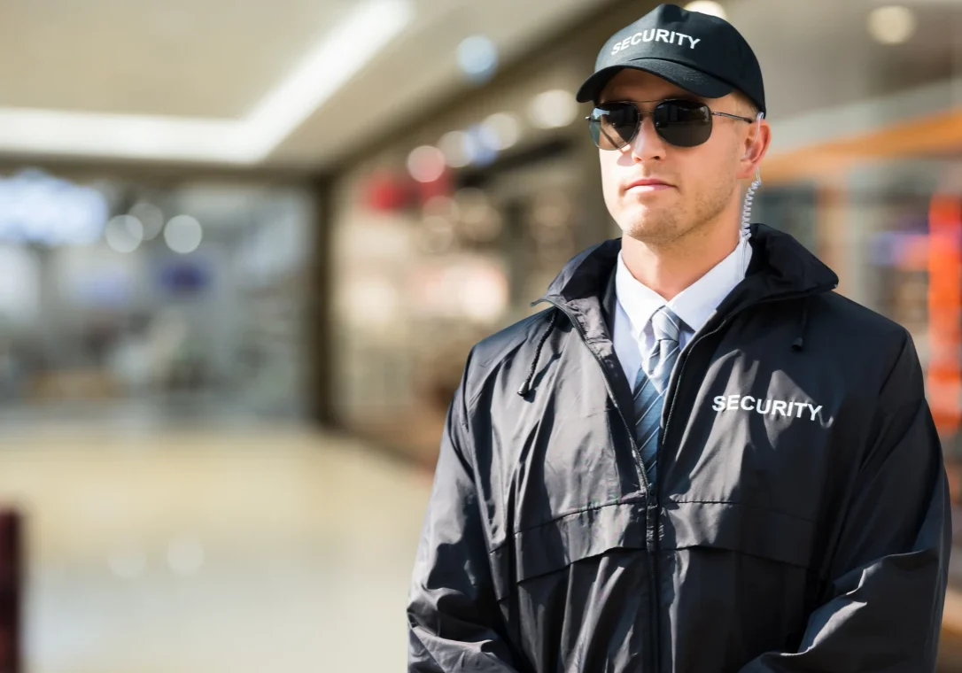 Guard wearing sunglasses and uniform